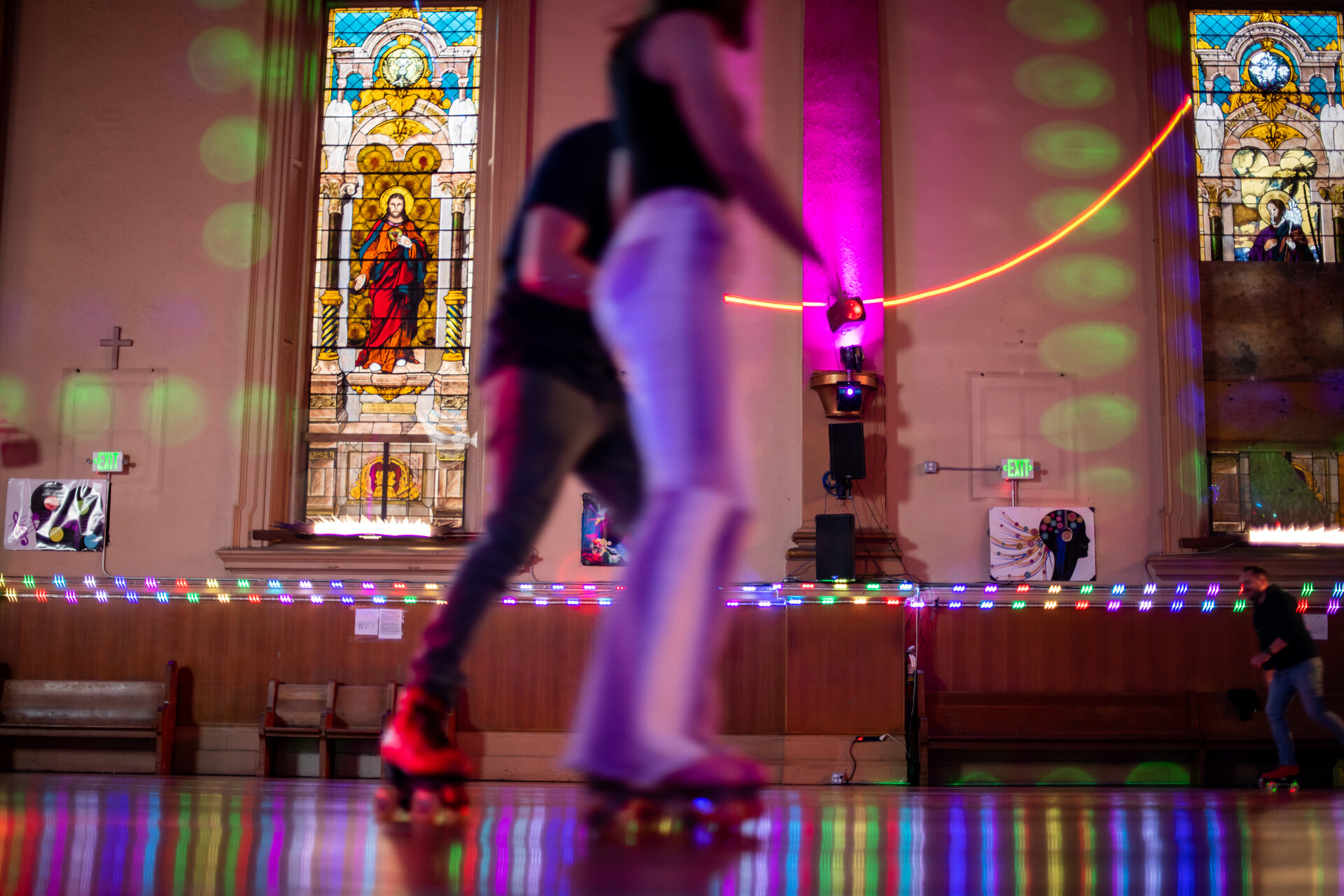 Skater enjoying the disco with stained glass windows